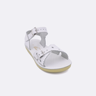 One little kid sized 1400 Sweetheart style sandal with white straps and a white insole. Facing left to right diagonally.