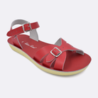 One Women's sized 1900 Boardwalk style sandal with red straps and a red insole. Facing left to right diagonally.