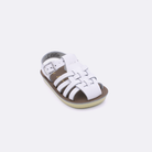 One baby sized 4200 Sailor style sandal with white straps and a beige insole. Facing left to right diagonally.