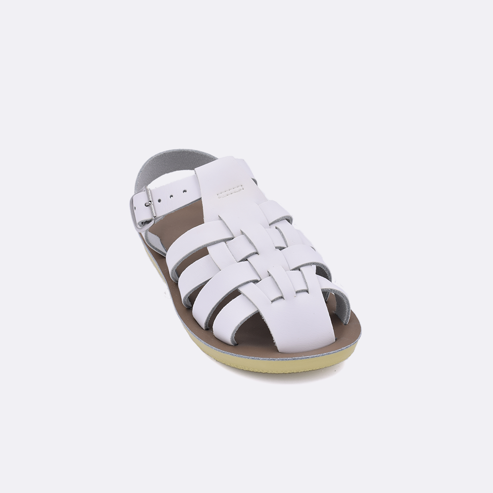 One little kid sized 4200 Sailor style sandal with white straps and a beige insole. Facing left to right diagonally.