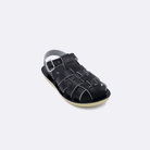 One toddler sized 4200 Sailor style sandal with black straps and a black insole. Facing left to right diagonally.