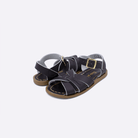 Two toddler sized 800 Original style sandals with brown straps and brown insoles. Both pushed together facing the camera diagonally.