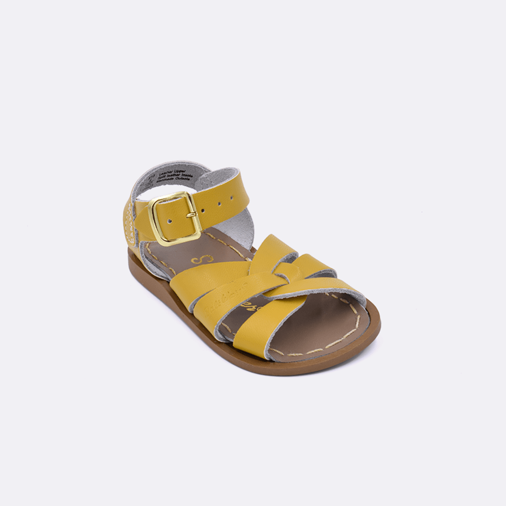 One baby size 800 Original style sandal color mustard. Facing left to right diagonally.