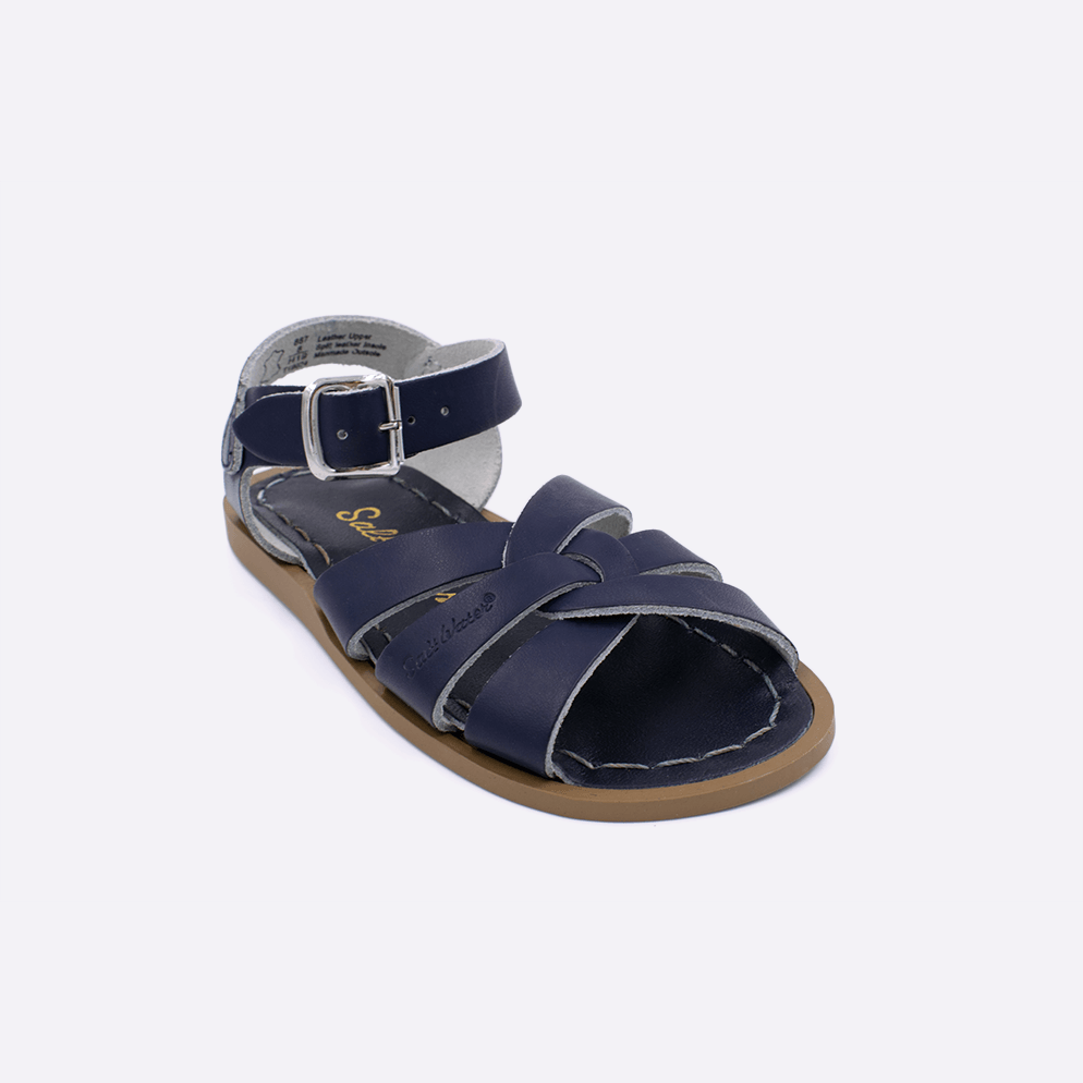 One toddler sized 800 Original style sandal with navy straps and a navy insole. Facing left to right diagonally.