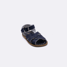 One baby size 800 Original style sandal color navy. Facing left to right diagonally.