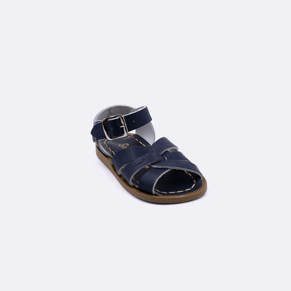 One baby size 800 Original style sandal color navy. Facing left to right diagonally.