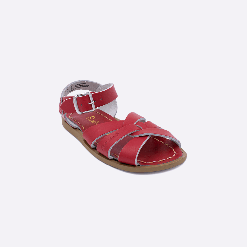 One toddler sized 800 Original style sandal with red straps and a red insole. Facing left to right diagonally.