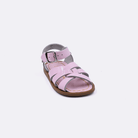 One baby size 800 Original style sandal color shiny pink. Facing left to right diagonally.