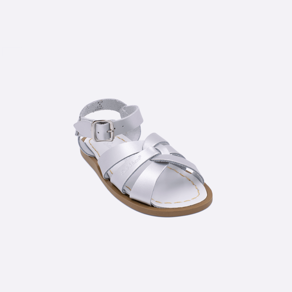 One toddler sized 800 Original style sandal with silver straps and a white insole. Facing left to right diagonally.