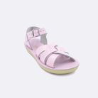One little kid sized 8000 Swimmer style sandal with shiny pink straps and a shiny pink insole. Facing left to right diagonally.