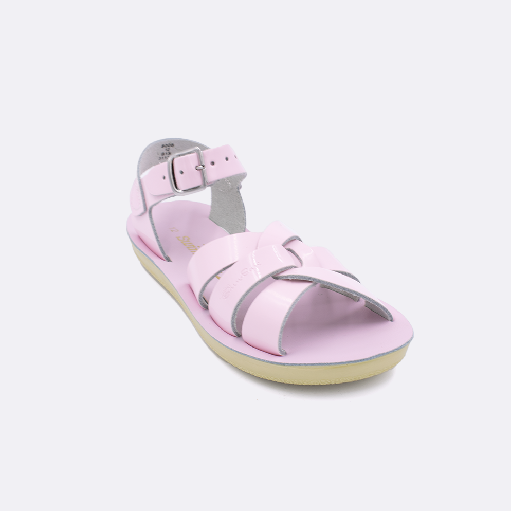 One little kid sized 8000 Swimmer style sandal with shiny pink straps and a shiny pink insole. Facing left to right diagonally.