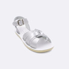 One little kid sized 8000 Swimmer style sandal with silver straps and a white insole. Facing left to right diagonally.