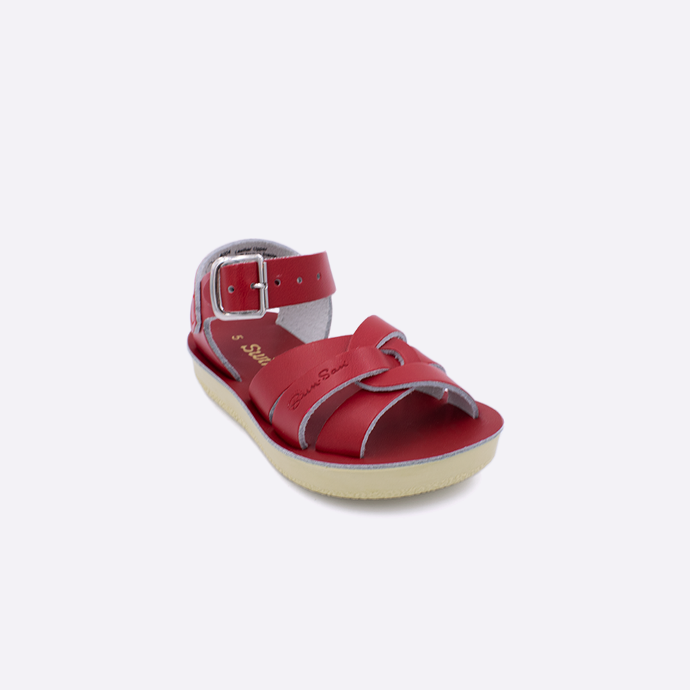 One toddler sized 8000 Swimmer style sandal with red straps and a red insole. Facing left to right diagonally.