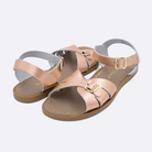 Two 900 Classic style sandal color rose gold. Both pushed together facing the camera diagonally.	Adult Size.