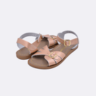 Two 900 Classic style sandal color rose gold. Both pushed together facing the camera diagonally.	Little Kid Size.