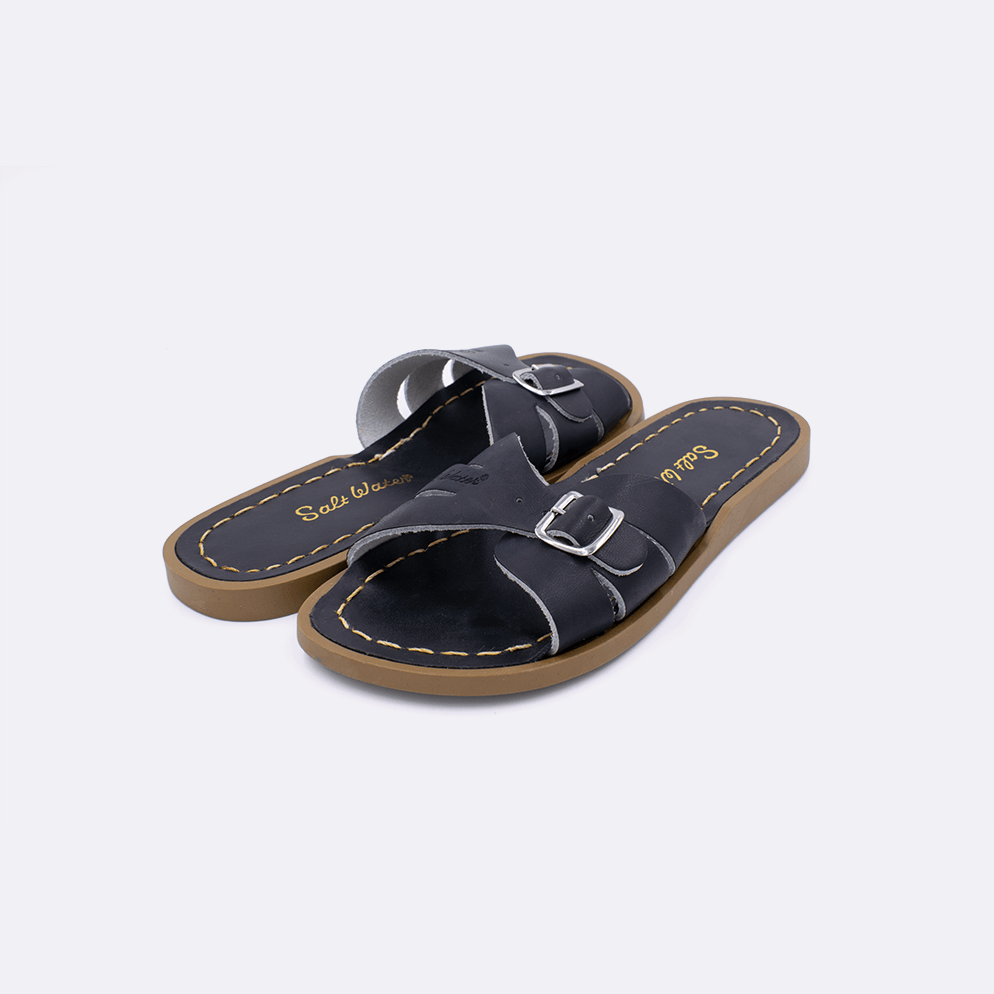 Two 9900 Classic Slide style sandal color black. Both pushed together facing the camera diagonally.	Little Kid Size.