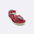 One little kid sized 1700 Surfer style sandal with red straps and a red insole. Facing left to right diagonally. 