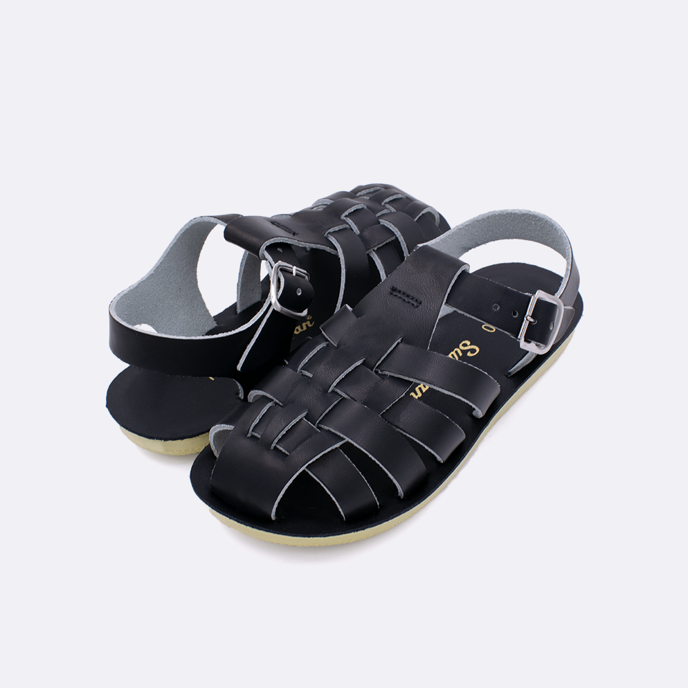 Two little kid sized 4200 Sailor style sandals with black straps and black insoles. Both pushed together facing the camera diagonally.