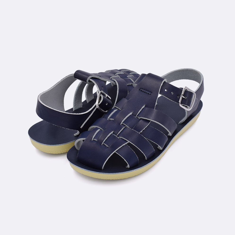 Two little kid sized 4200 Sailor style sandals with navy straps and navy insoles. Both pushed together facing the camera diagonally.