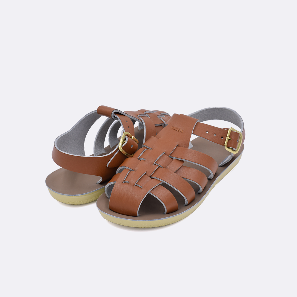 Two little kid sized 4200 Sailor style sandals with tan straps and beige insoles. Both pushed together facing the camera diagonally.