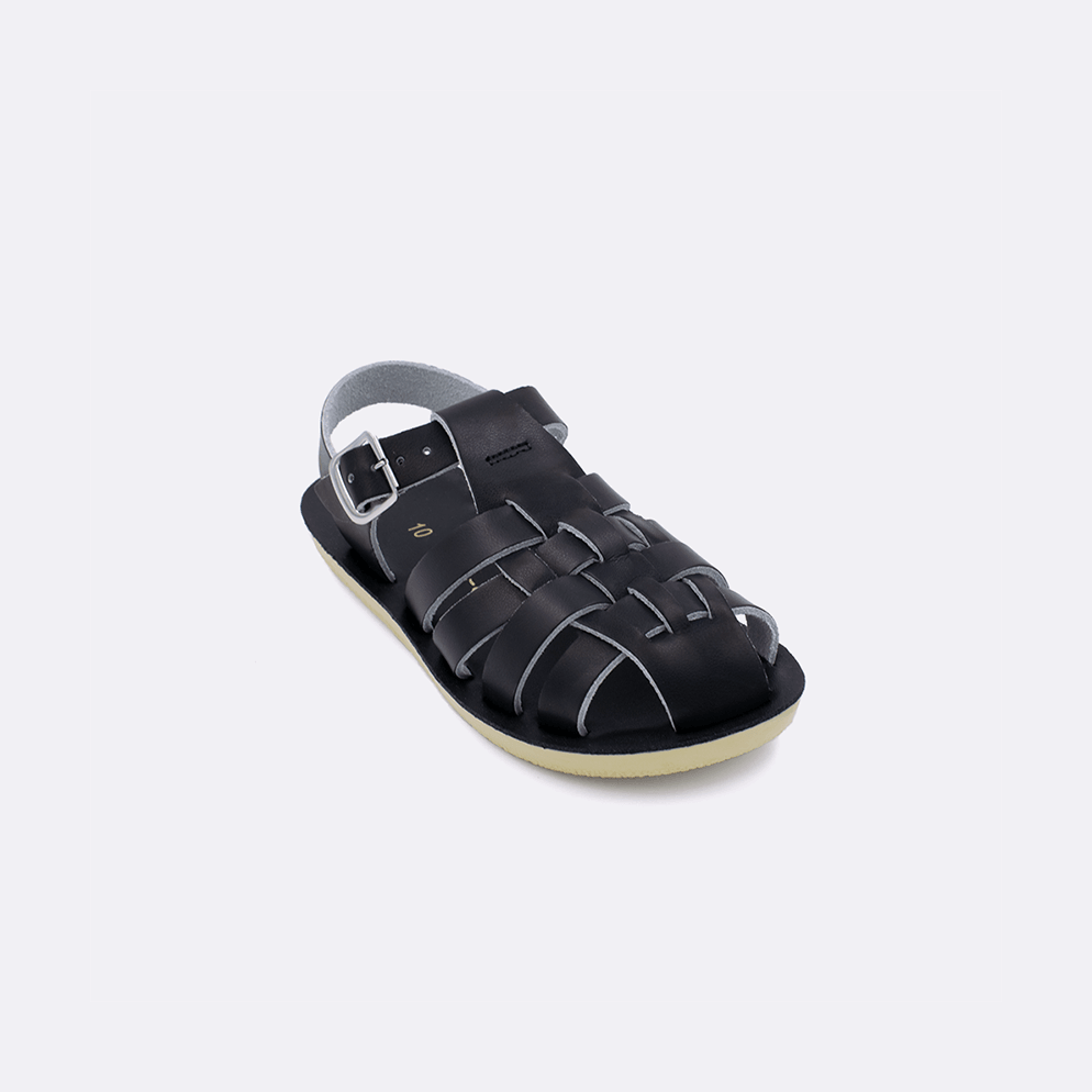One toddler sized 4200 Sailor style sandal with black straps and a black insole. Facing left to right diagonally. 