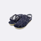 Two toddler sized 4200 Sailor style sandals with navy straps and navy insoles. Both pushed together facing the camera diagonally.