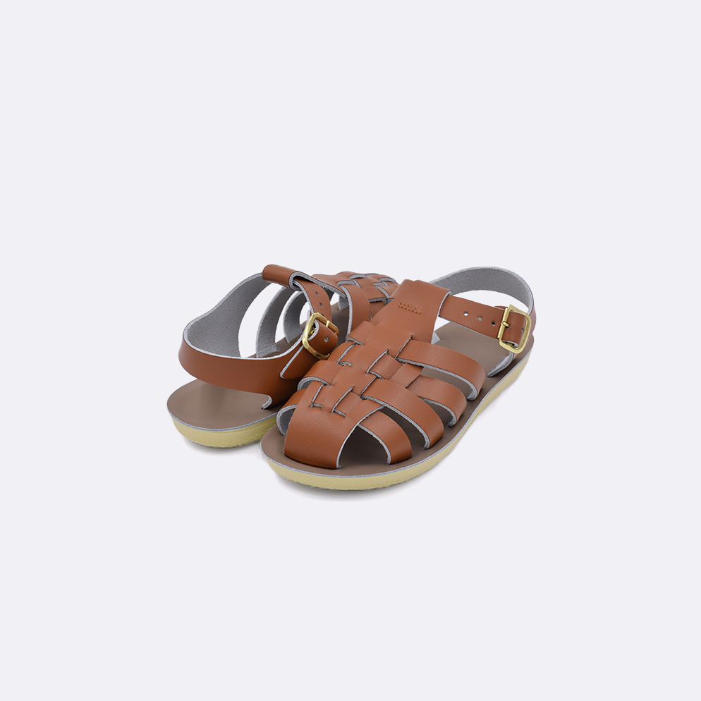 Two toddler sized 4200 Sailor style sandals with tan straps and beige insoles. Both pushed together facing the camera diagonally.
