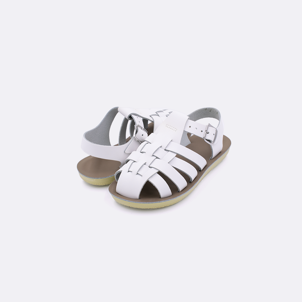 Two toddler sized 4200 Sailor style sandals with white straps and beige insoles. Both pushed together facing the camera diagonally.