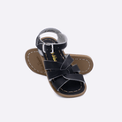 Two toddler sized 800 Original style sandals with black straps and black insoles.  One standing with the sole facing the camera. The second is laying diagonally over the top left edge of the sole.