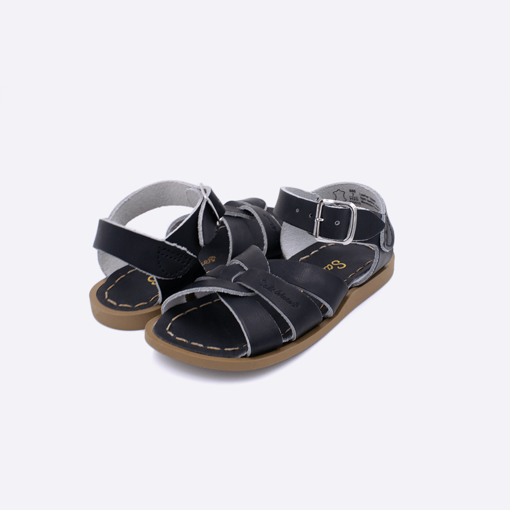 Two toddler sized 800 Original style sandals with black straps and black insoles. Both pushed together facing the camera diagonally.