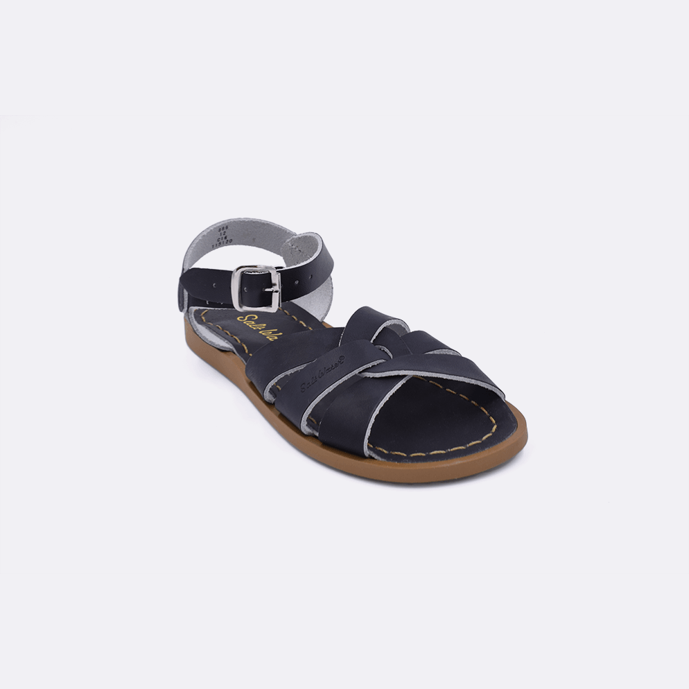 One little kid size 800 Original style sandal color black. Facing left to right diagonally. 