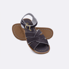 Two brown little kid sized 800 Original style sandals.  One standing with the sole facing the camera. The second is laying diagonally over the top left edge of the sole.