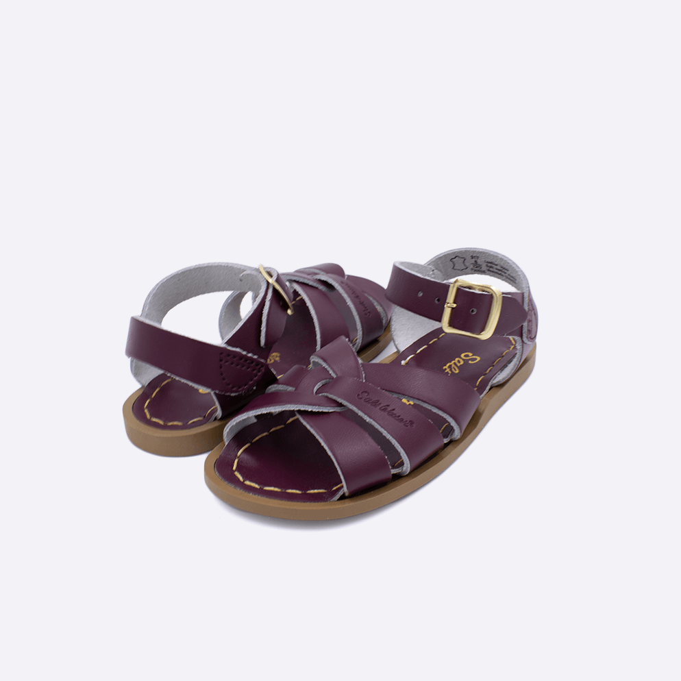 Two toddler sized 800 Original style sandals with claret straps and claret insoles. Both pushed together facing the camera diagonally.