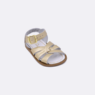 One 800 Original style sandal color gold. Facing left to right diagonally. 	Baby size