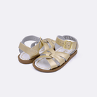 Two 800 Original style sandal color gold. Both pushed together facing the camera diagonally.	Baby size