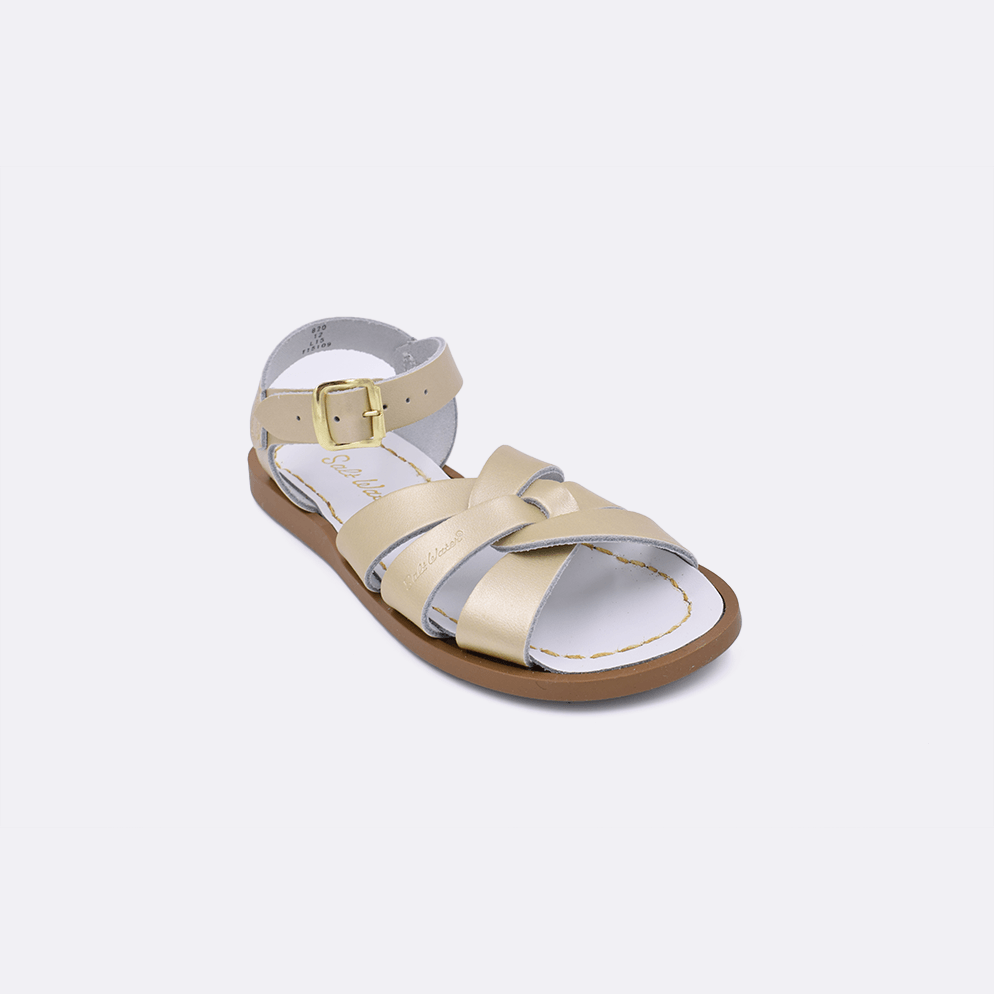 One gold little kid sized 800 Original style sandal. Facing left to right diagonally. 