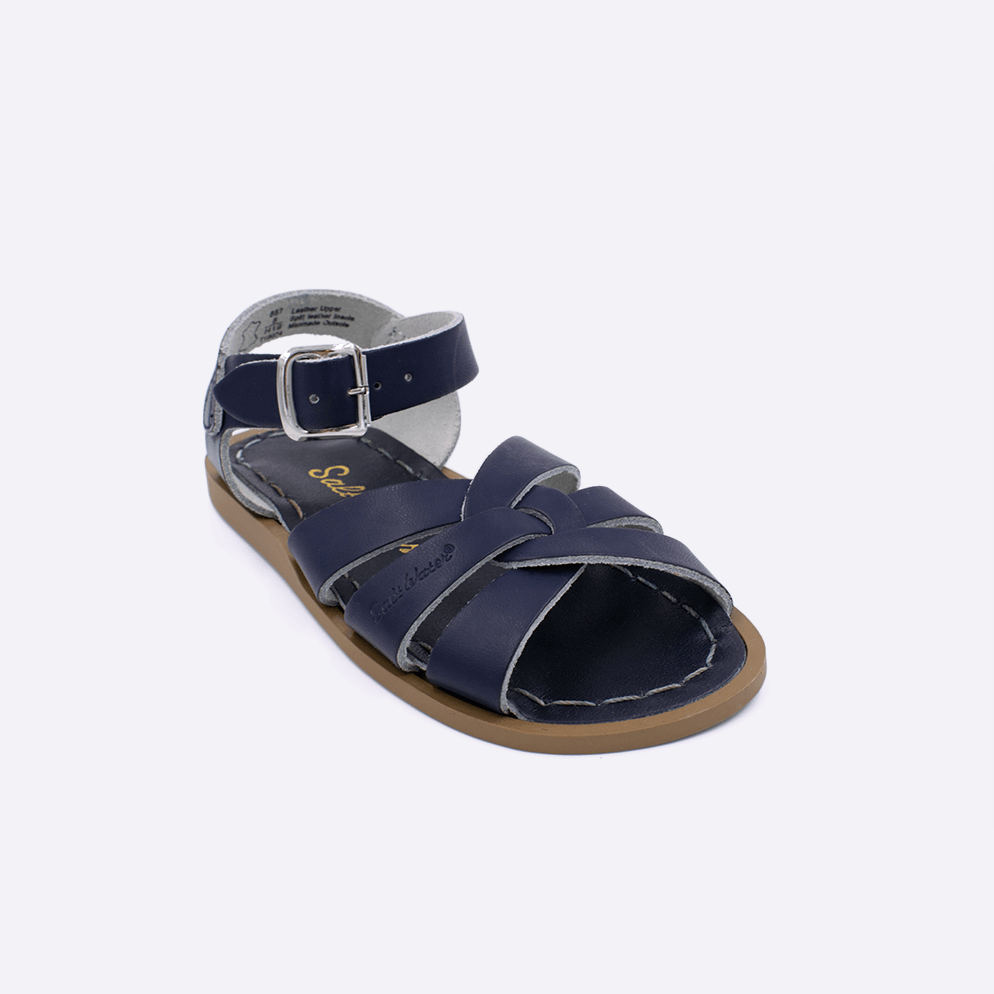 One toddler sized 800 Original style sandal with navy straps and a navy insole. Facing left to right diagonally. 