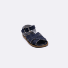 One baby size 800 Original style sandal color navy. Facing left to right diagonally. 