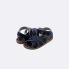 Two baby size 800 Original style sandal color navy. Both pushed together facing the camera diagonally.