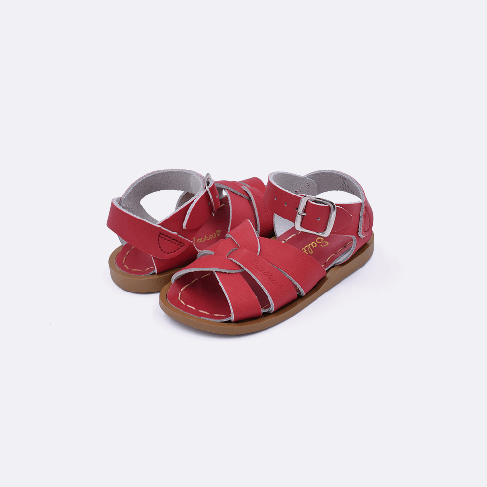 Two baby size 800 Original style sandal color red. Both pushed together facing the camera diagonally.