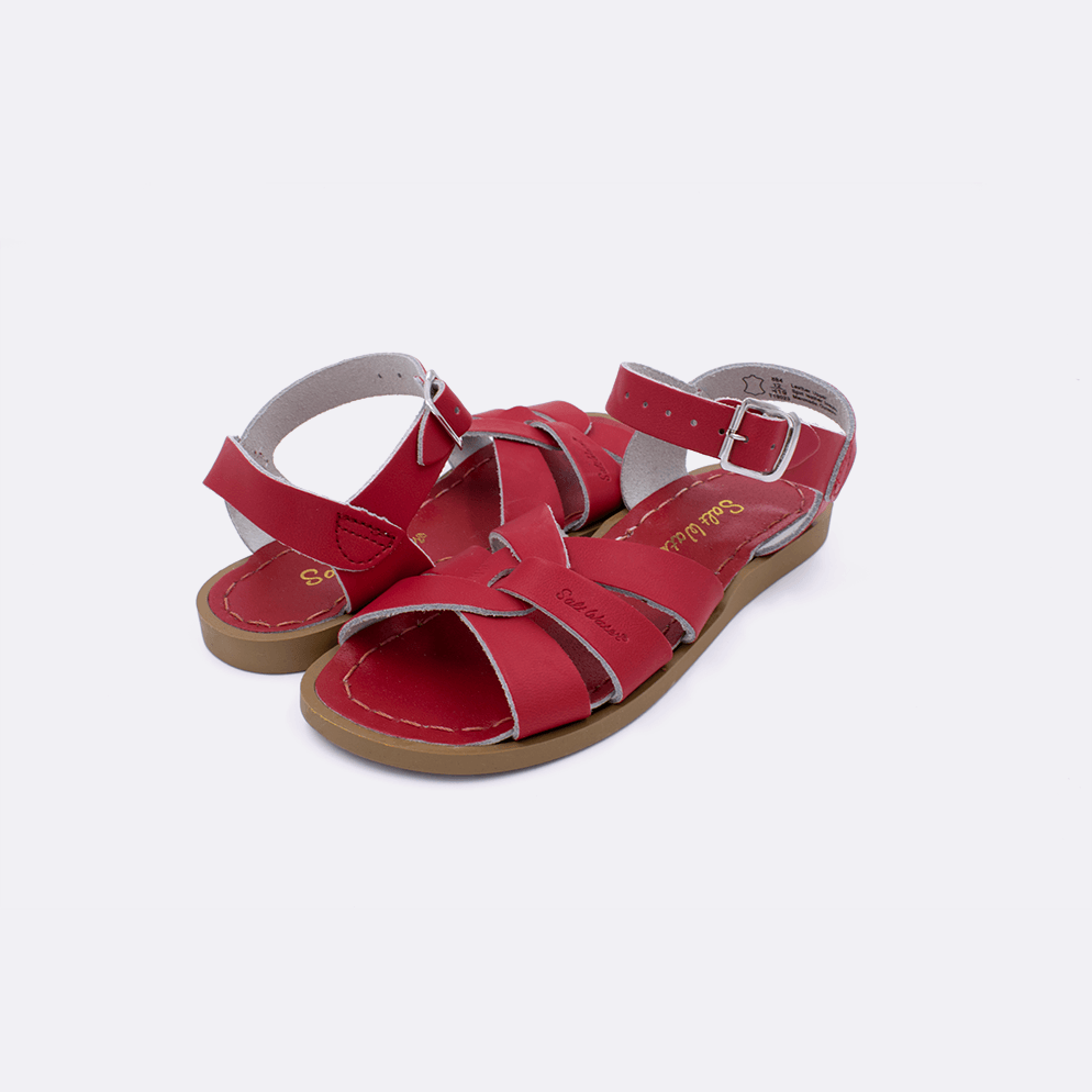 Two red little kid sized 800 Original style sandal. Both pushed together facing the camera diagonally.