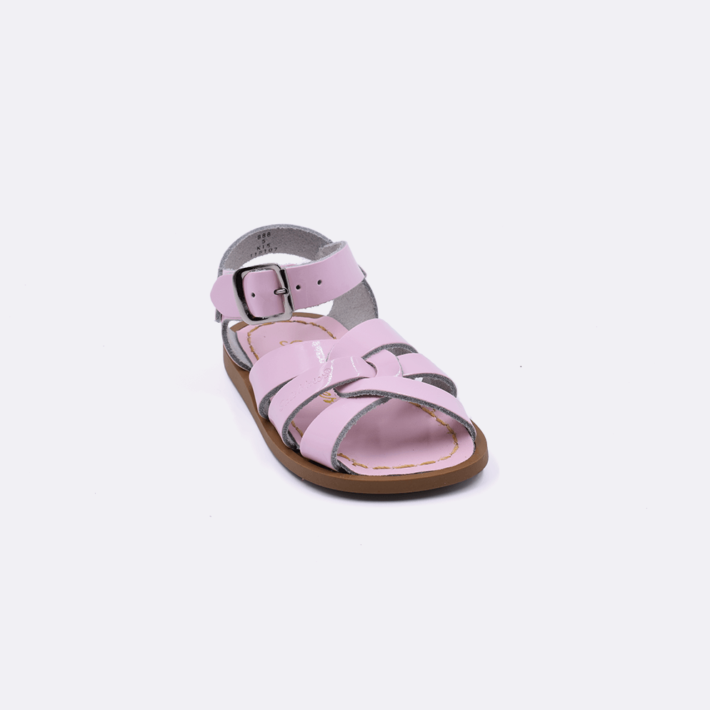 One baby size 800 Original style sandal color shiny pink. Facing left to right diagonally. 