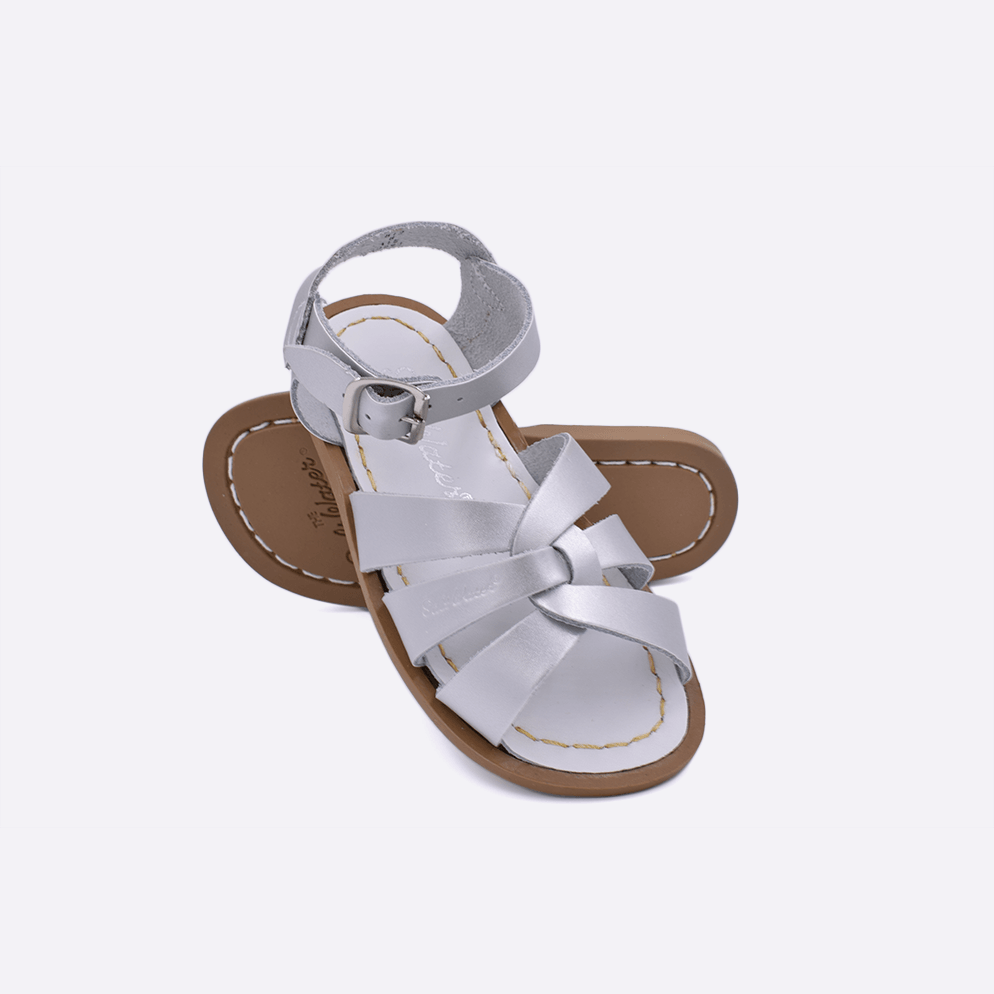 Two baby sized 800 Original style sandals with silver straps and white insoles. Both pushed together facing the camera diagonally.