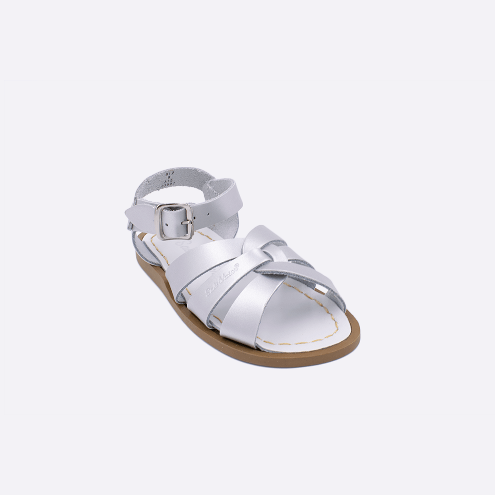One toddler sized 800 Original style sandal with silver straps and a white insole. Facing left to right diagonally. 