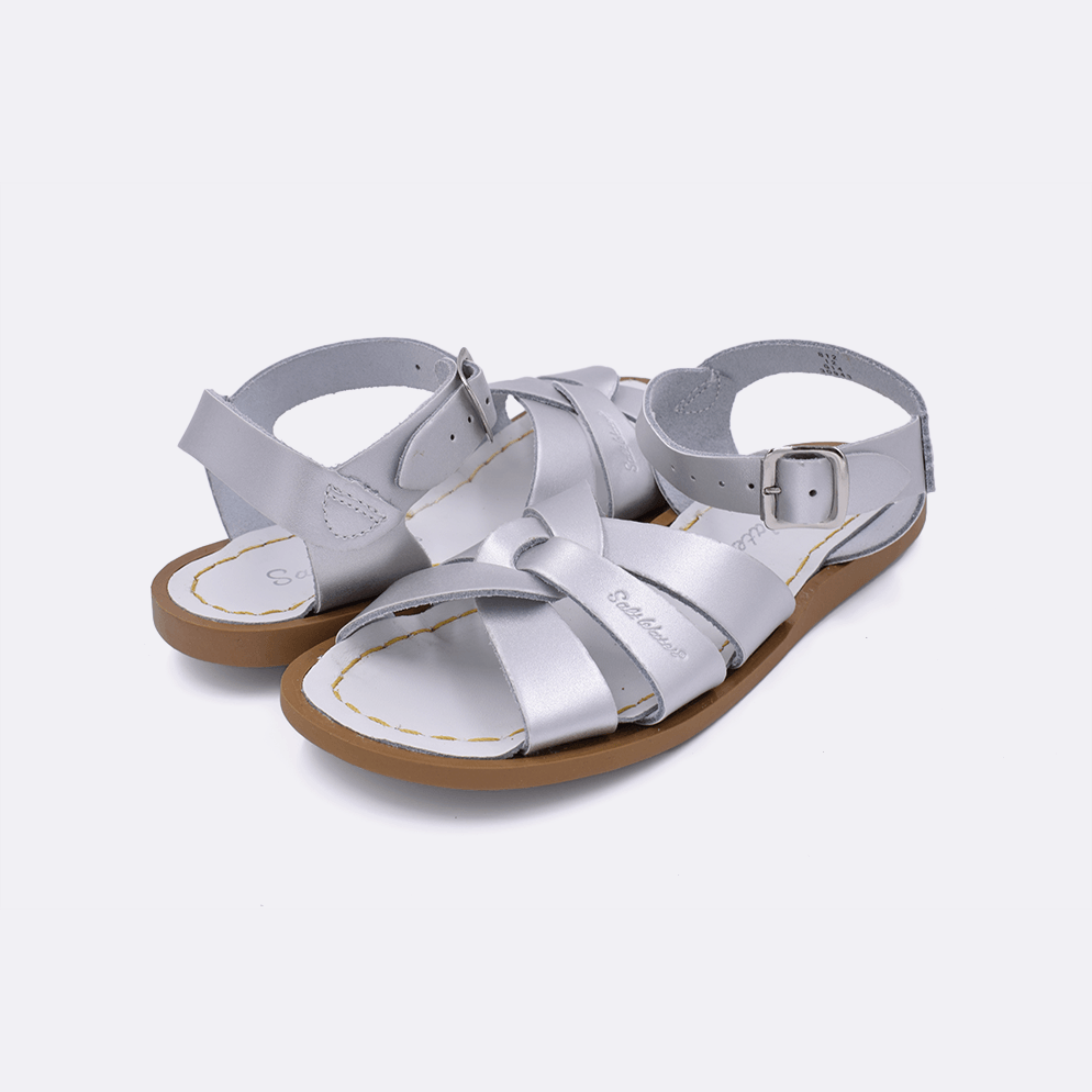 Two silver little kid sized 800 Original style sandal. Both pushed together facing the camera diagonally.