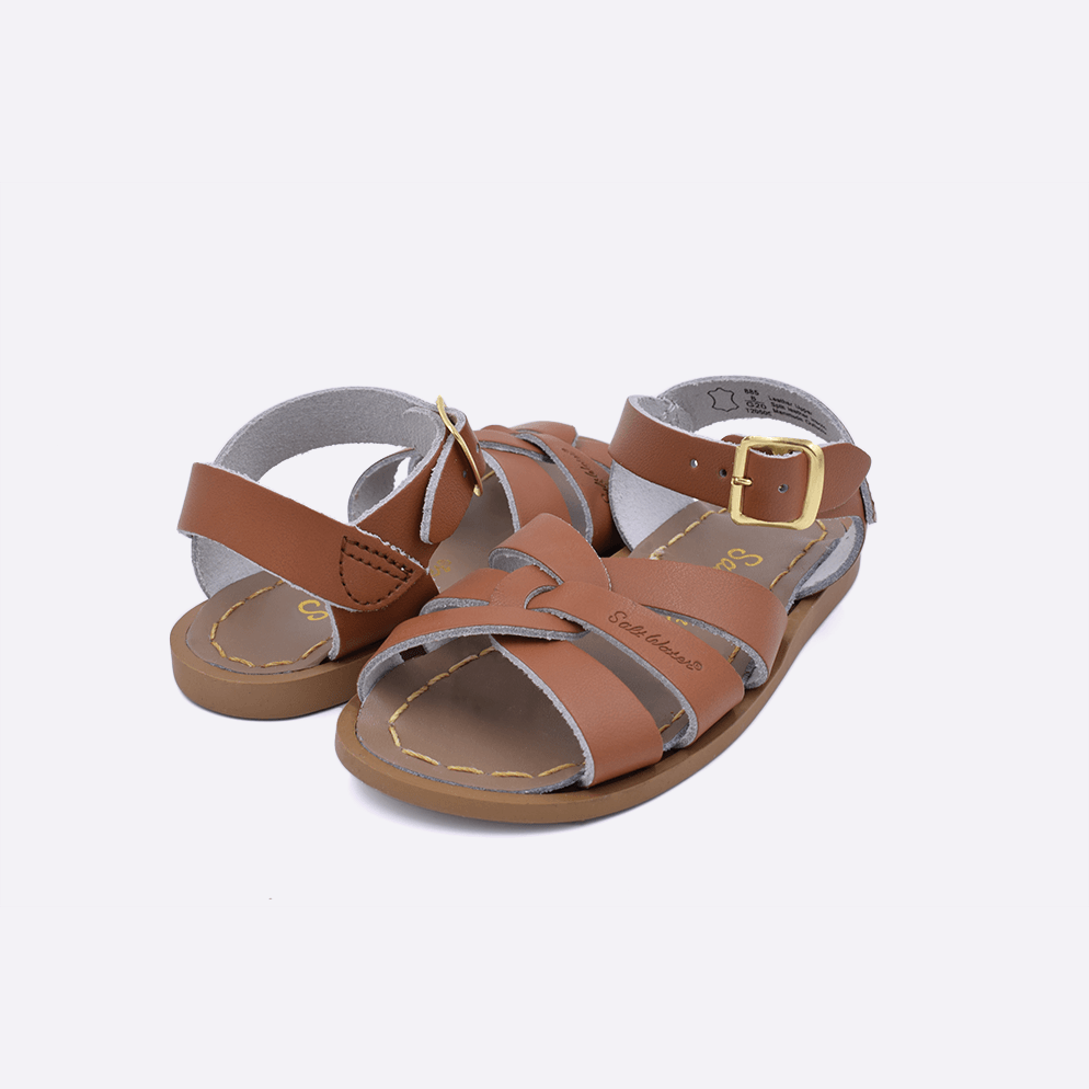 Two toddler sized 800 Original style sandals with tan straps and beige insoles. Both pushed together facing the camera diagonally.