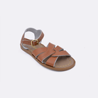 One tan little kid sized 800 Original style sandal. Facing left to right diagonally. 