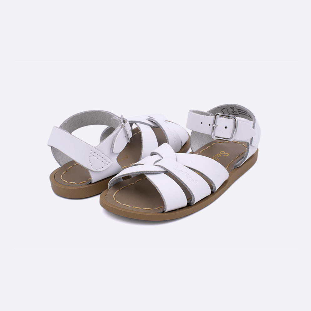 Two toddler sized 800 Original style sandals with white straps and beige insoles. Both pushed together facing the camera diagonally.