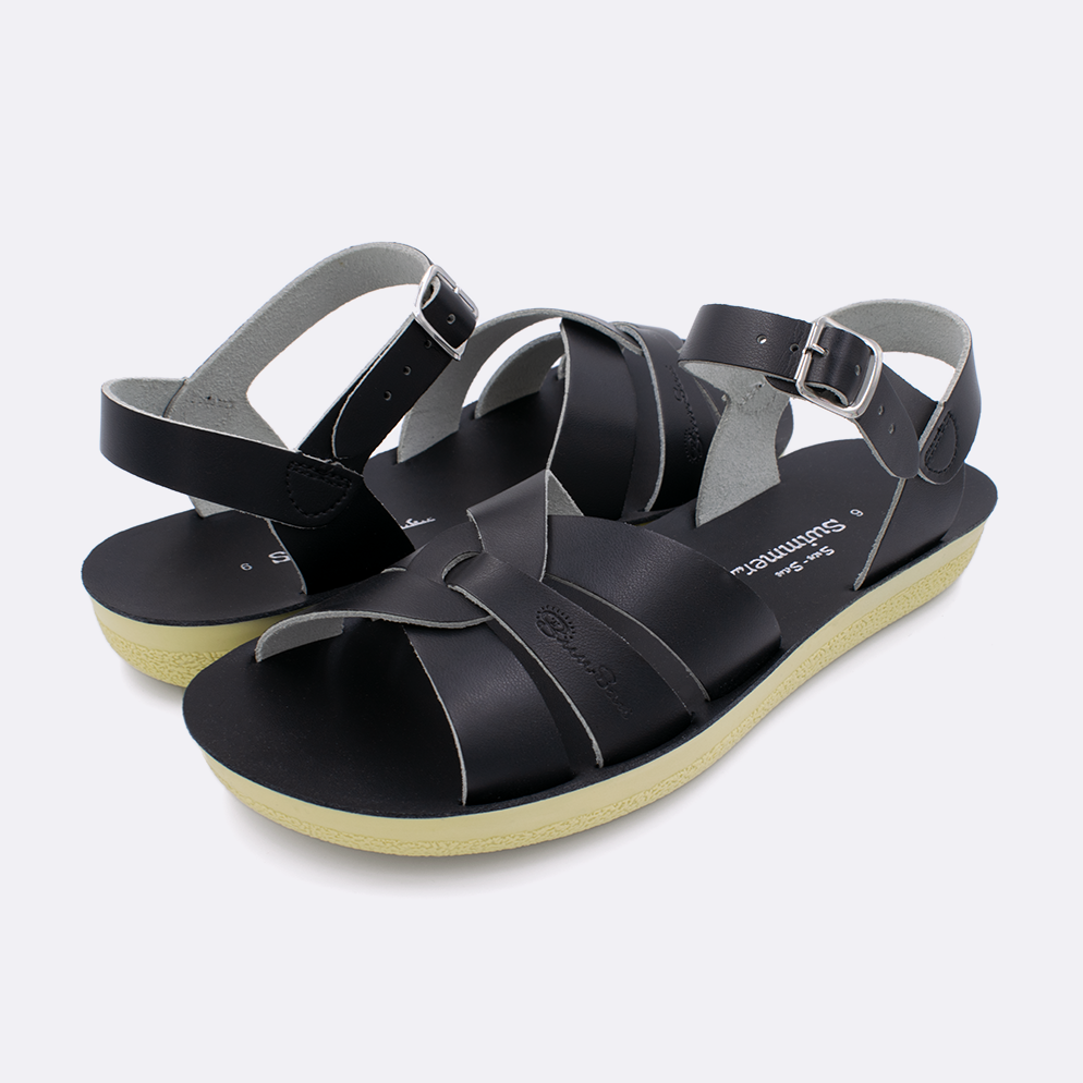 Two women's sized 8000 Swimmer style sandals with black straps and black insoles. Both pushed together facing the camera diagonally.