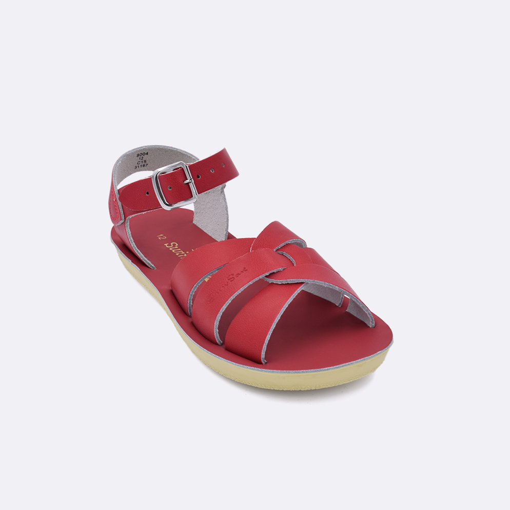 One little kid sized 8000 Swimmer style sandal with red straps and a red insole. Facing left to right diagonally. 